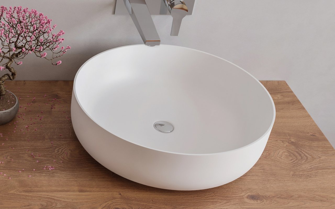 https://www.aquaticabath.ca/cache/images/1280x800a-ffffff/aquatica/Aurora-White-Round-Stone-Vessel-Sink-07-(web).jpg